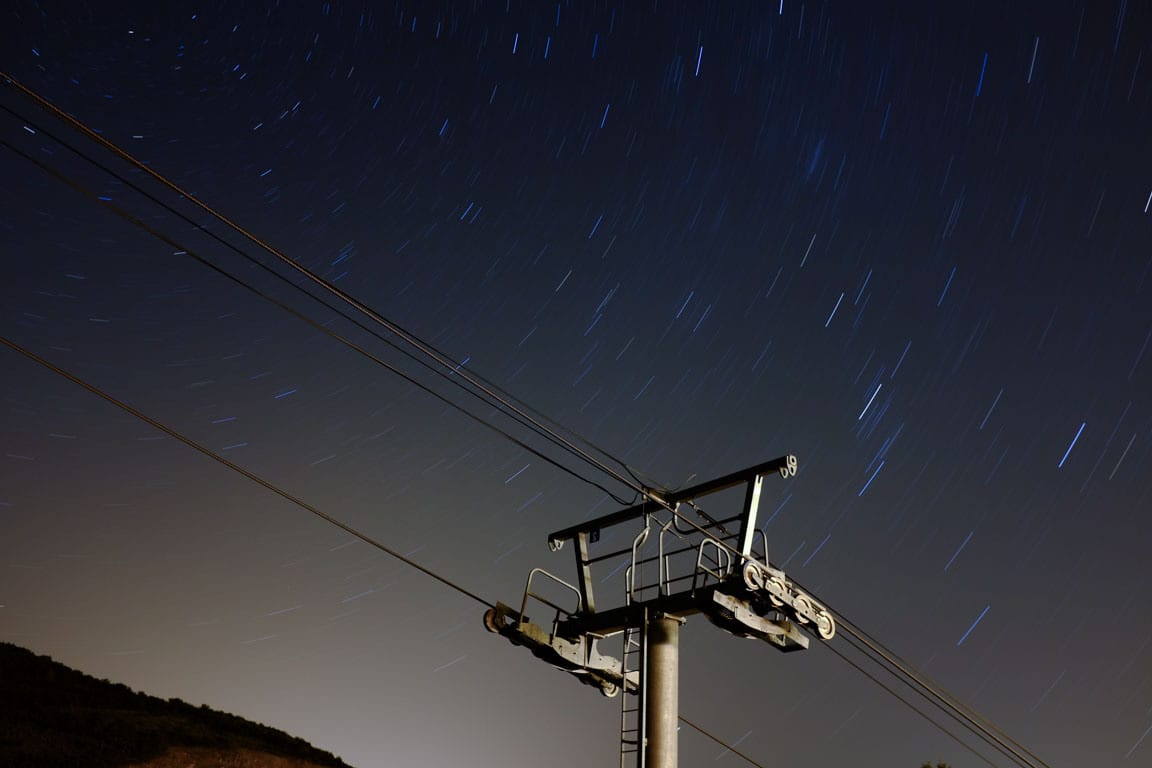  Fuji X100S at f/5.6 for 11min 20sec (ISO 200). It probably should've been at least an extra stop and twice as long to get better defined star trails